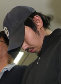 울산 자매살인 김홍일, 항소심서 무기징역 감형…유족 항의