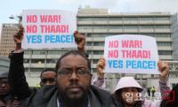 ‘NO WAR, NO THAAD, YES PEACE’