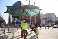 무학, 부산시 내에 더위 피할 대형 그늘막 설치